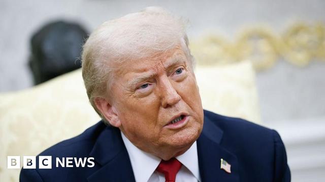 A headshot of Trump