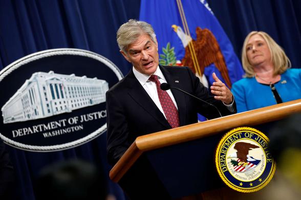 Administrator for the Centers for Medicare and Medicaid Services Mehmet Oz, joined by HHS Acting Inspector General Juliet Hodgkins, delivers remarks during a press conference at the U.S. Department of Justice on June 30, 2025, in Washington, D.C.