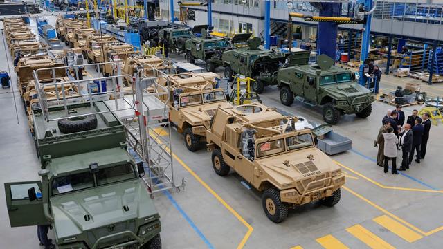 Military vehicles in a factory. | Lavandeira JR/EPA