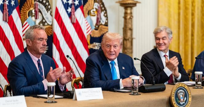 President Trump on Wednesday at the White House with Health Secretary Robert F. Kennedy Jr., left, and Mehmet Oz, the administrator for the Centers for Medicare and Medicaid Services.