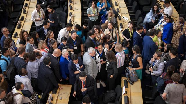 Delegates at the talks in Geneva. | © Fabrice Coffrini, AFP