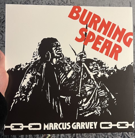 Burning Spear’s Marcus Garvey album cover featuring warriors in black and white. 
